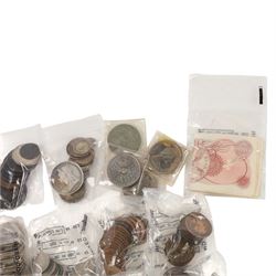 Approximately 116 grams of Great British pre-1920 and approximately 240 grams of Great British pre-1947 silver coins, together with two South Africa silver two and a half shilling coins, George III 1979 cartwheel twopence, approximately thirteen Queen Elizabeth II ten shilling notes, pre-decimal coins, etc