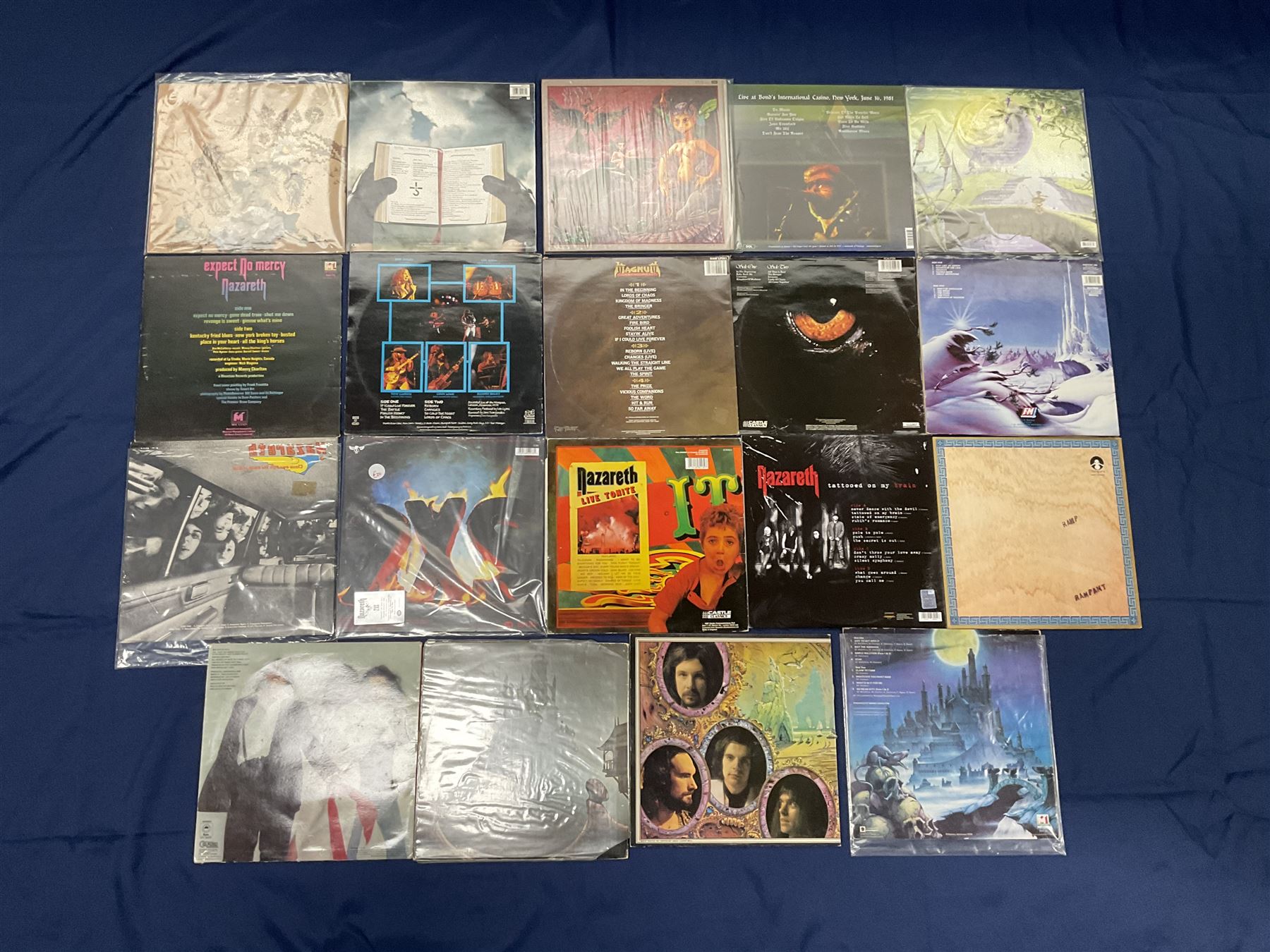 Rock, hard rock and progressive rock vinyl LPs including Greenslade 'Bedside manners are extra', 'Time and Tide', Nazareth 'No mean city', 'Close enough for Rock 'n' Roll', 'tattooed on my brain', 'Rampant', 'expect no mercy', Magnum 'Marauder', 'Anthology', 'Kingdom of Madness', 'Lost On The Road To Eternity' etc (19)
