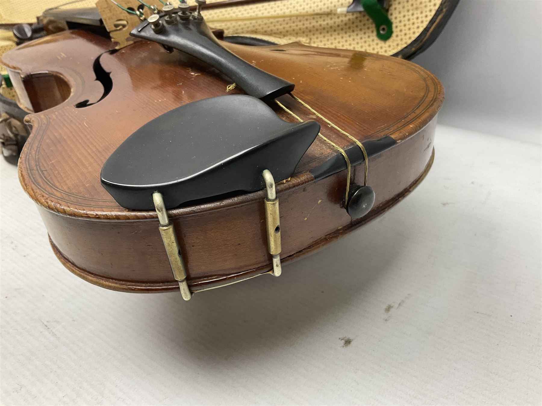 German copy of a Maggini violin c1900 with 35.5cm two-piece maple back and ribs and spruce top, bears label 'Maggini Deutsche Arbeit 1866' L59cm; in carrying case with bow