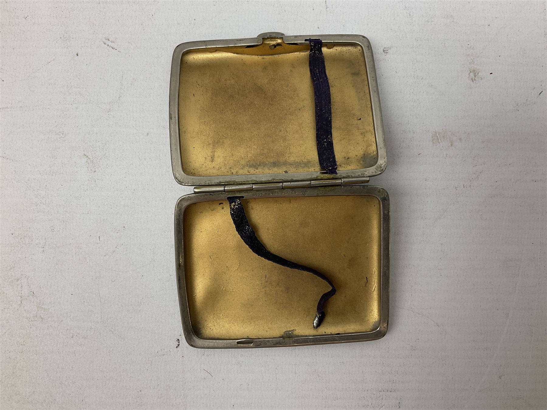  Victorian sampler worked with the alphabet by Carrie Monkman 1886, Victorian silver-plated cigarette case, Carlo simulated tortoiseshell motorised fan in case, Folding Opera Glasses, two chrome leaping Jaguar brooch and matching pin badge, quantity of sewing threads, lace etc