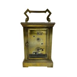 French - early 20th century 8-day brass carriage clock with a anglaise case and gilt dial surround, round enamel dial with blue Arabic numerals and steel spade hands, lever platform jewelled escapement. Movement backplate stamped R & Co Paris.
 
