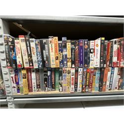 Two bays of vintage VHS videos, approx. 300 - viewing and collection at Duggleby Storage, YO11 3TX