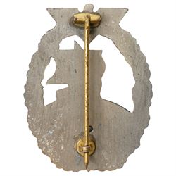 German Third Reich Krim shield arm badge 1941-1942, Auxiliary Cruiser badge and a WWI first class Iron Cross with field conversion (3) 