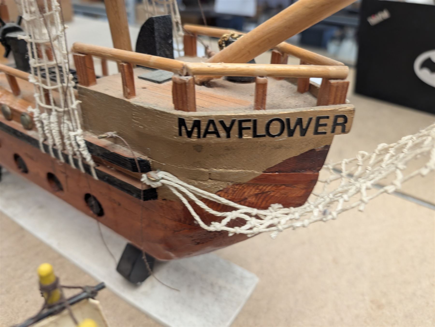 Wooden model ship 'Mayflower', together with a similar smaller example, largest H56cm