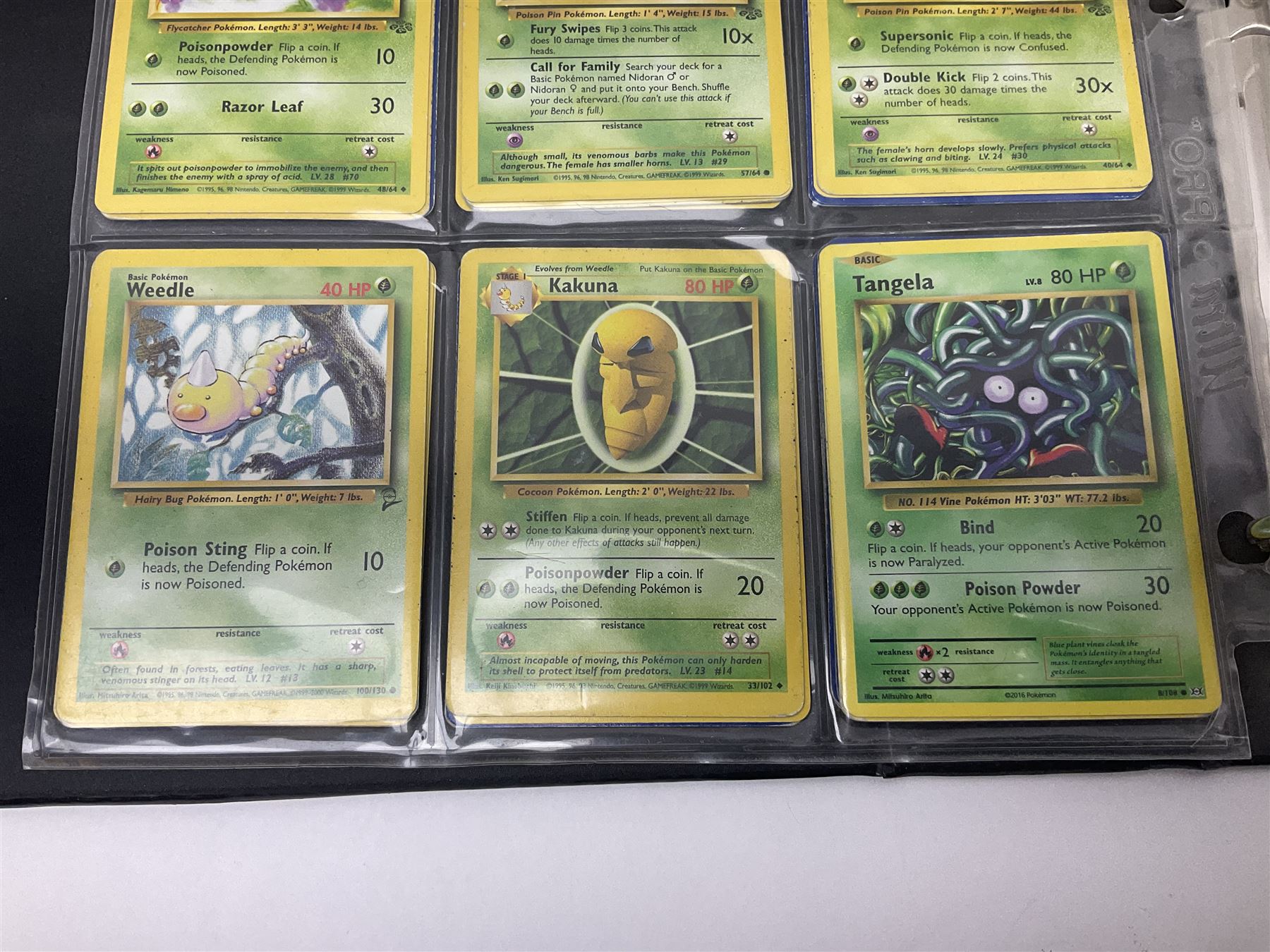 Collection of Pokemon trading cards, mostly 1999 Wizards Pokemon cards to include holo Charizard 4/102, first edition holo Machamp 8/102, further holographic cards; Dark Flareon 35/82 and Dark Vaporeon 45/82, cards from themed sets and 4th edition prints; 1998 Electronic Pokédex with cardboard boxes for themed decks Blackout, Overgrowth and Power Reserve Jungle, along with a large quantity of energy and trainer cards 