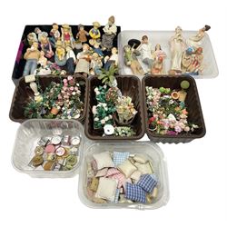 Collection of miniature composite dolls house figures, to include chimney sweep and grocer, together with miniature dolls house tins, cushions, rugs and garden flowers and accessories, etc, in two boxes