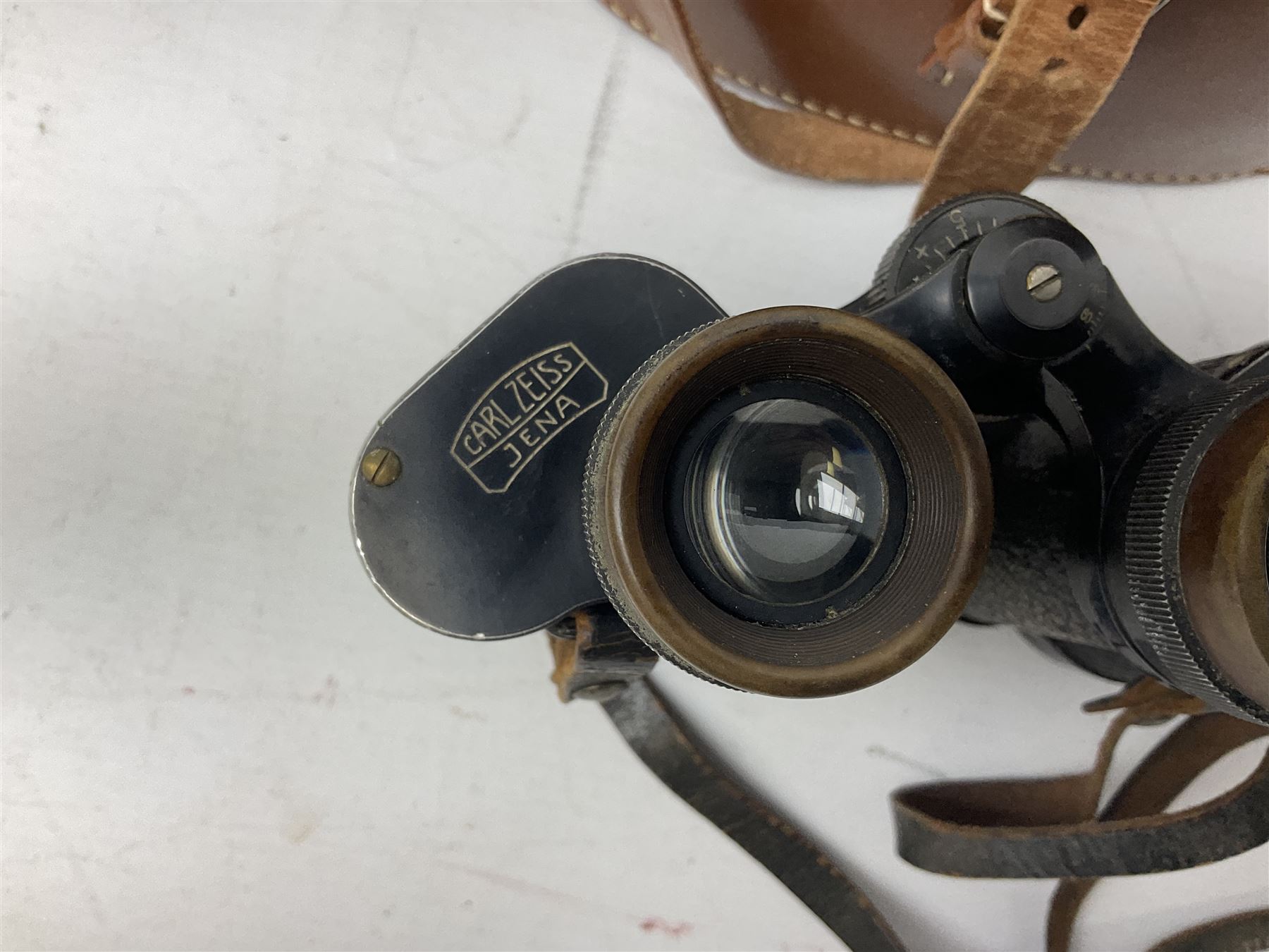 Three pairs of Carl Zeiss Jena binoculars, Jenoptem 10x50W, Jenoptem 8x30W and Deltrintem 8x30W, all cased (3)