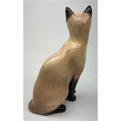A large Sylvac figure of a Terrier dog No 1380, H28cm, together with a large Sylvac figure of a Rabbit No 1027, and a Sylvac figure of a bear cup, a  Royal Doulton figure of a cat No 1867, a further Royal Doulton figure of a cat HN2655, a Whyte & Mackay Eagle decanter, and a large figure of a Leopard cub. 