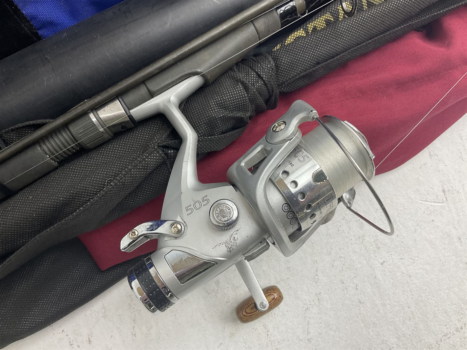Fishing equipment, comprising reels to include Daiwa No.7300, boxed, Quick GLX 840, Quantum Heat BCS 350, okuma etc, together with various tackle, various poles, split canes and rods to include Middy Xtreme, Shakespeare Quo Carp, etc, many in bags