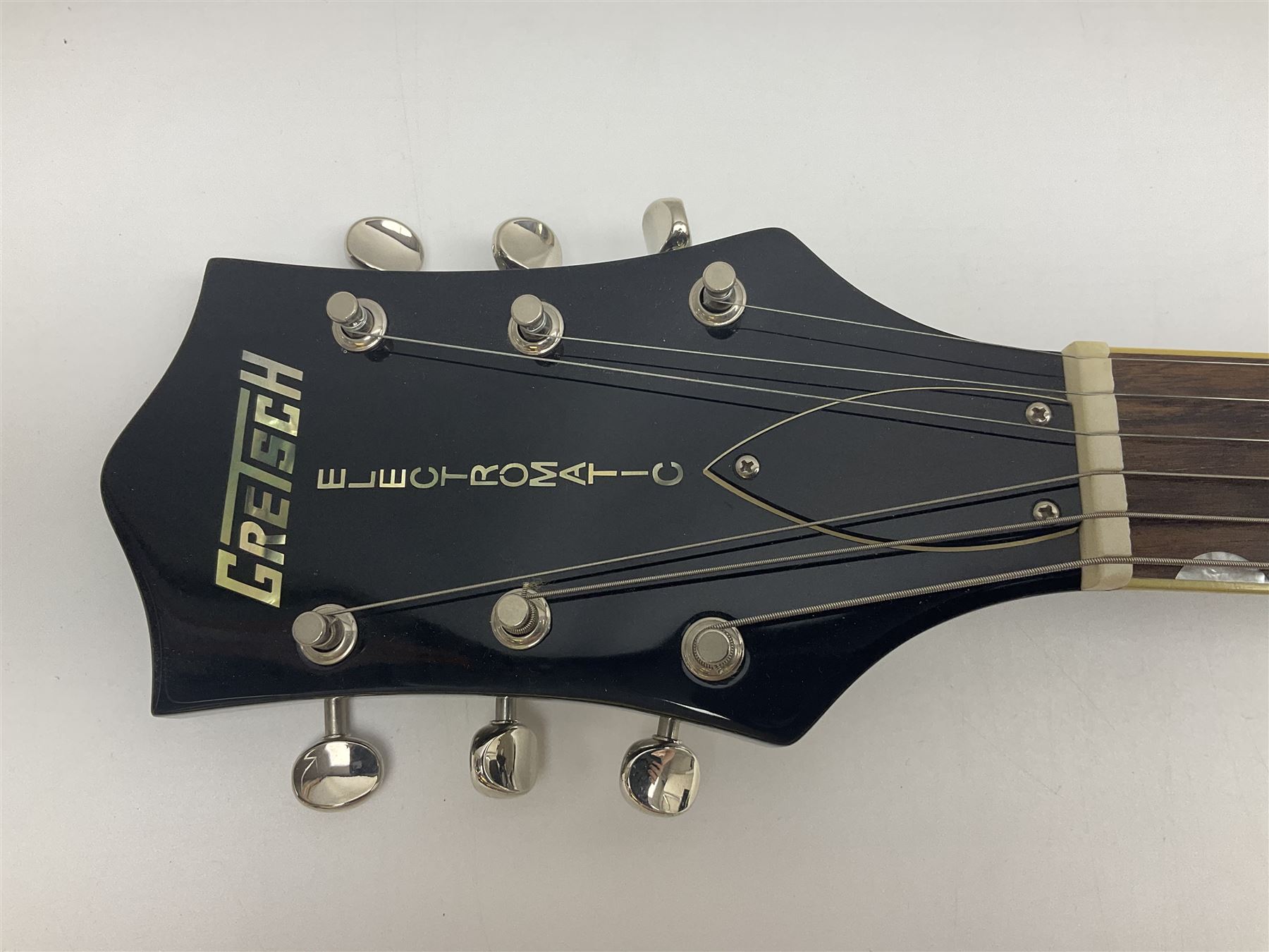 Gretsch Electromatic semi-acoustic guitar model G5129 in black and red with Bigsby tremolo, serial no.KS05063904; L105cm; in fitted hard carrying case