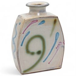 Philip Leach (British 1947-) for Springfield Pottery slab vase, of squat form, the white ground decorated with geometric pink, blue and green sprays, impressed mark to base H14cm 