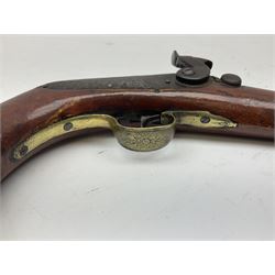 Re-manufactured percussion converted from flintlock single barrel pistol, the 20cm barrel with ramrod under, reused back action lock, brass furniture and hardwood stock L41cm overall