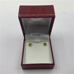 Pair of 9ct gold green stone stud earrings, boxed