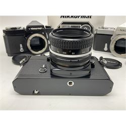 Nikkormat FT2 camera body, serial no. 5066813, in original packaging, together with Nikkormat EL camera body, serial no. 5577358, with Nikon Nikkor 50mm 1:1.8' lens no. 2143575, Nikkormat FT, serial no. 3968385, and Nikomat FT camera body, serial no. 4015491