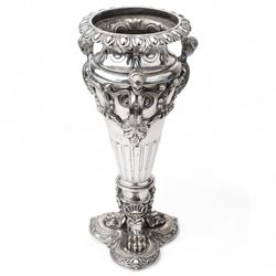 19th century silver plated vase of tapering form with lappet border and three caryatid handles surrounded with laurel wreath cartouches raised on triple paw feet on lobed base H28cm