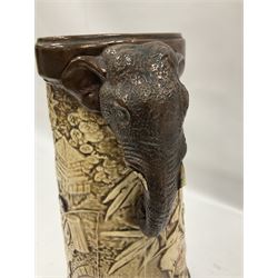  Bretby vase of tapering form decorated with elephants, cranes and fishermen, with twin elephant mask handles, stamped Bretby 2246 marks beneath