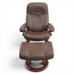 Ekornes - Stressless medium brown leather recliner swiveling armchair and stool, brown leather recline with stitching, together with a matching stool, on a round base