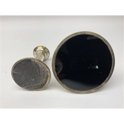 1920's silver mounted capstan inkwell, hallmarked Charles Boyton & Son Ltd, London 1929, together with an early 20th century silver mounted dwarf candlestick, hallmarked A J Pepper & Co, Birmingham 1918