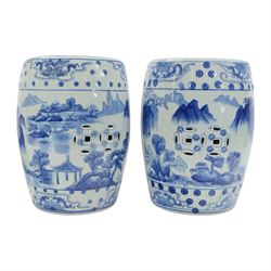 Pair of Chinese blue and white garden stools, decorated with pagodas a landscape, H40cm 