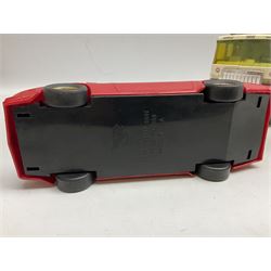 American Nylint large scale tin-plate car transporter L59cm carrying a Testor Toys plastic car; Tonka tin-plate mobile crane; boxed Sarony Cigarettes tin-plate roulette game with rules; and Japanese style tin-plate box, the lid inset with a revolving poker dice game (4)