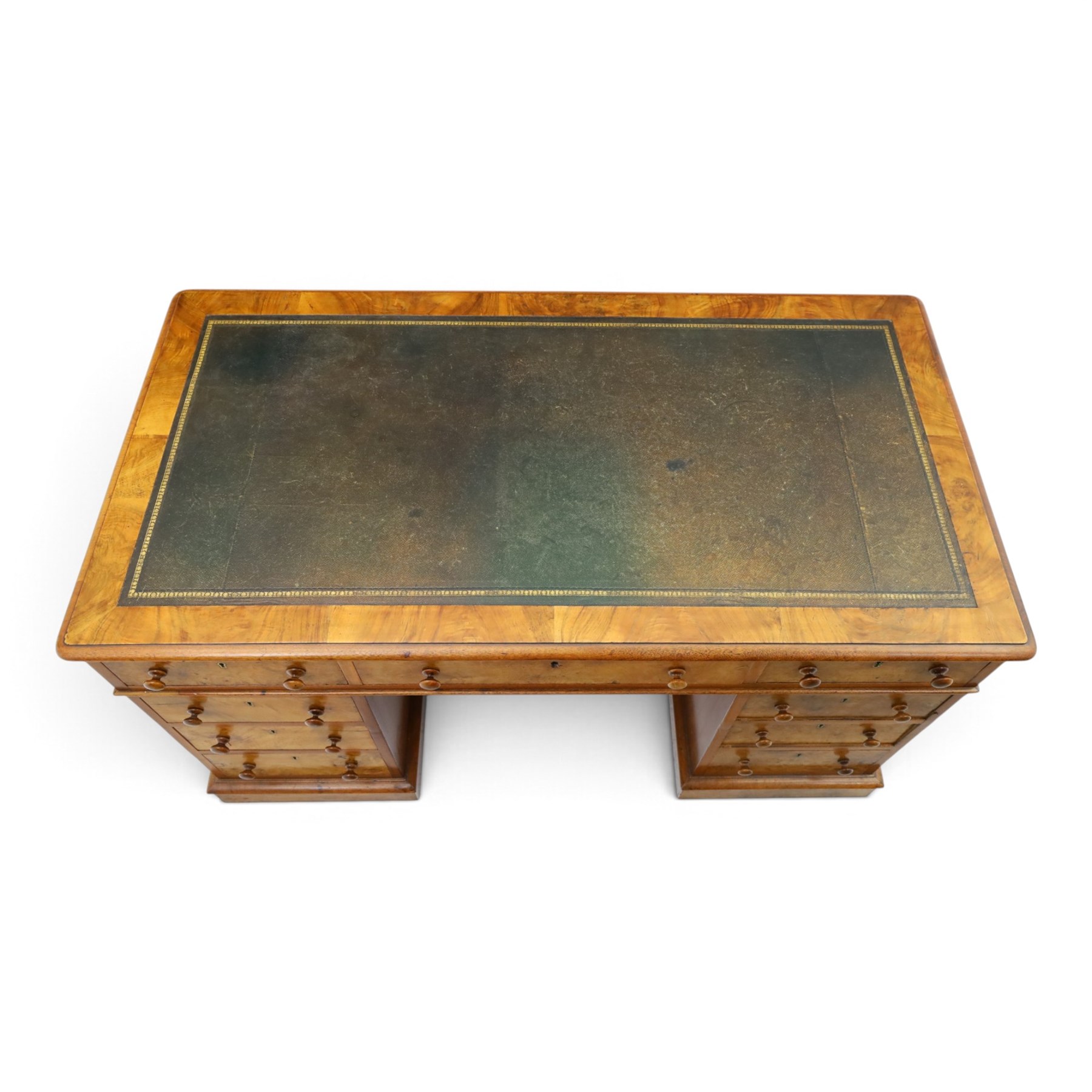 19th century burr walnut twin pedestal desk, rectangular top inset tooled green leather insert with moulded edge, frieze with three drawers with turned wooden pulls, raised on pedestal bases, containing three graduated drawers raised on plinth bases with castors