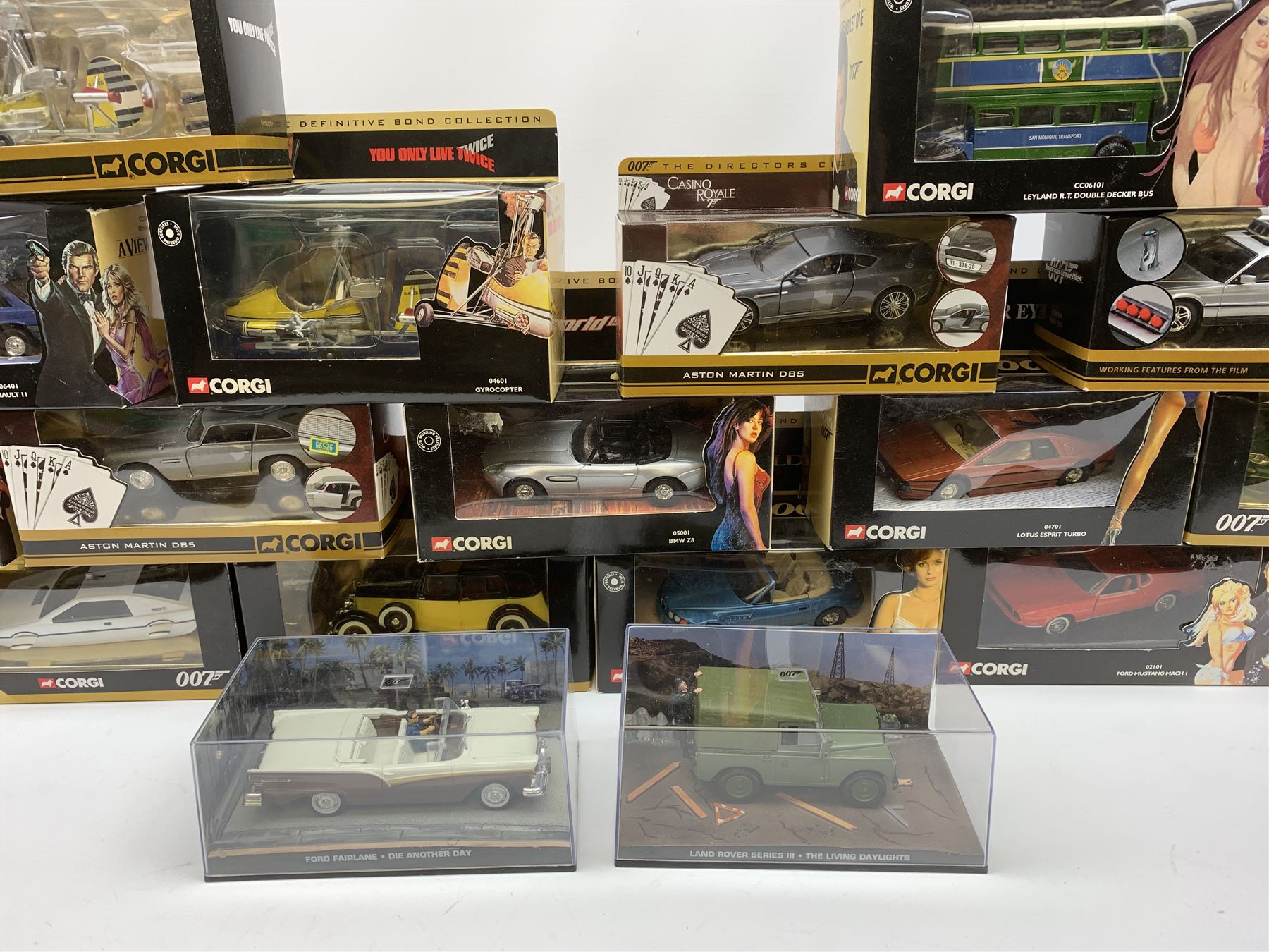 Corgi James Bond - seventeen models from various films including Goldfinger, Octopussy, Diamonds Are Forever, For Your Eyes Only, Casino Royale, Live And Let Die, You Only Live Twice etc including ten from The Definitive Bond Collection and seven from The Director's Cut, all in window boxes; together with two others by Fabbri in perspex display cases (19)