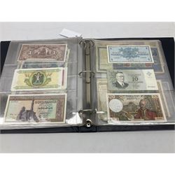 World banknotes, including Queen Elizabeth II The States of Jersey one pound 'DB202703', five pounds 'BB527762' and ten pounds 'AB651481', reserve bank of New Zealand two dollars '1L3 741894', King George V Straits Settlements one dollar 1st January 1935 'F/83 28924', various Bank of England notes etc, housed in two ring binder albums