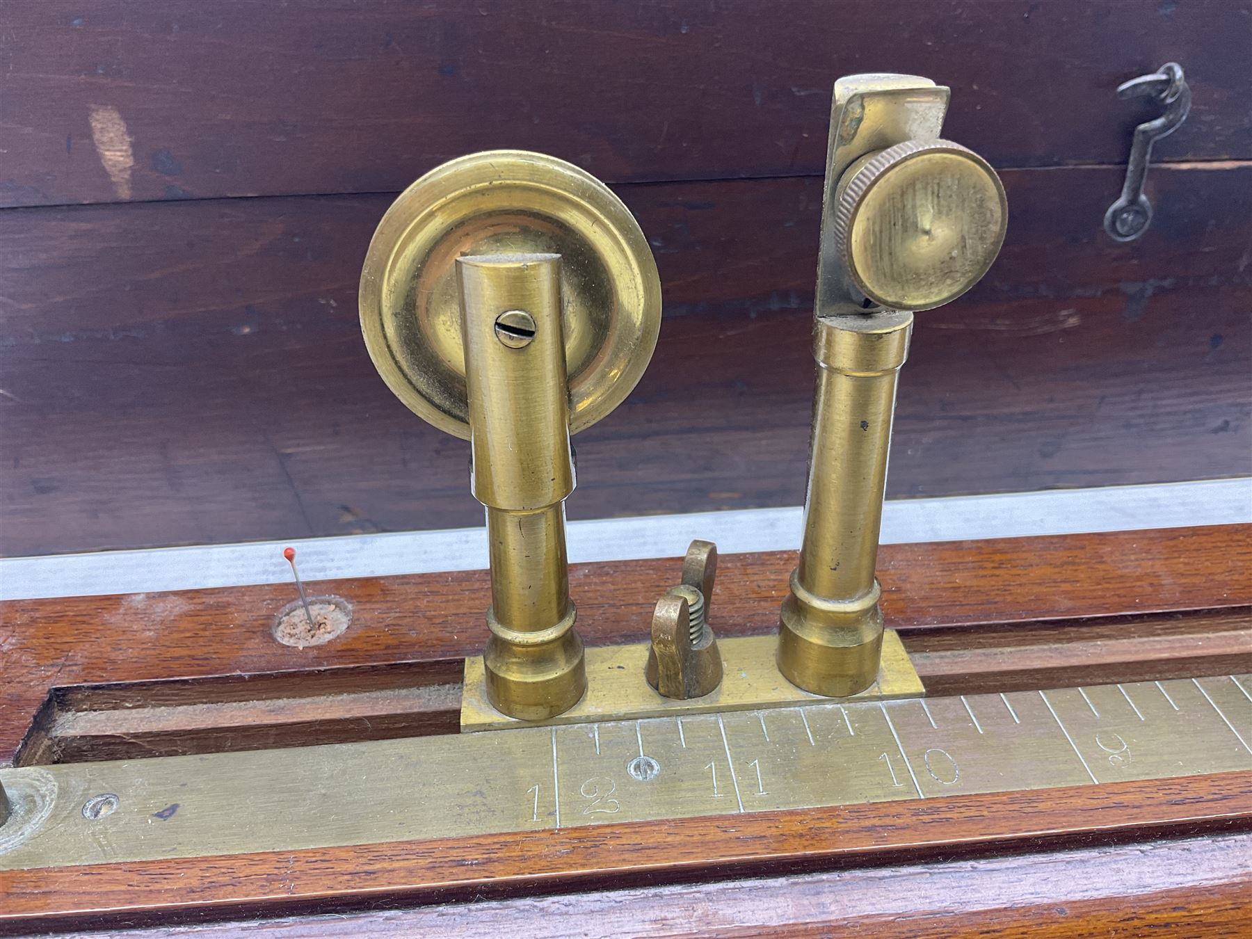 Early 20th century worsted spinners walnut and brass twist tester by J.H. Heal Maker Halifax L61cm; in original box with paperwork