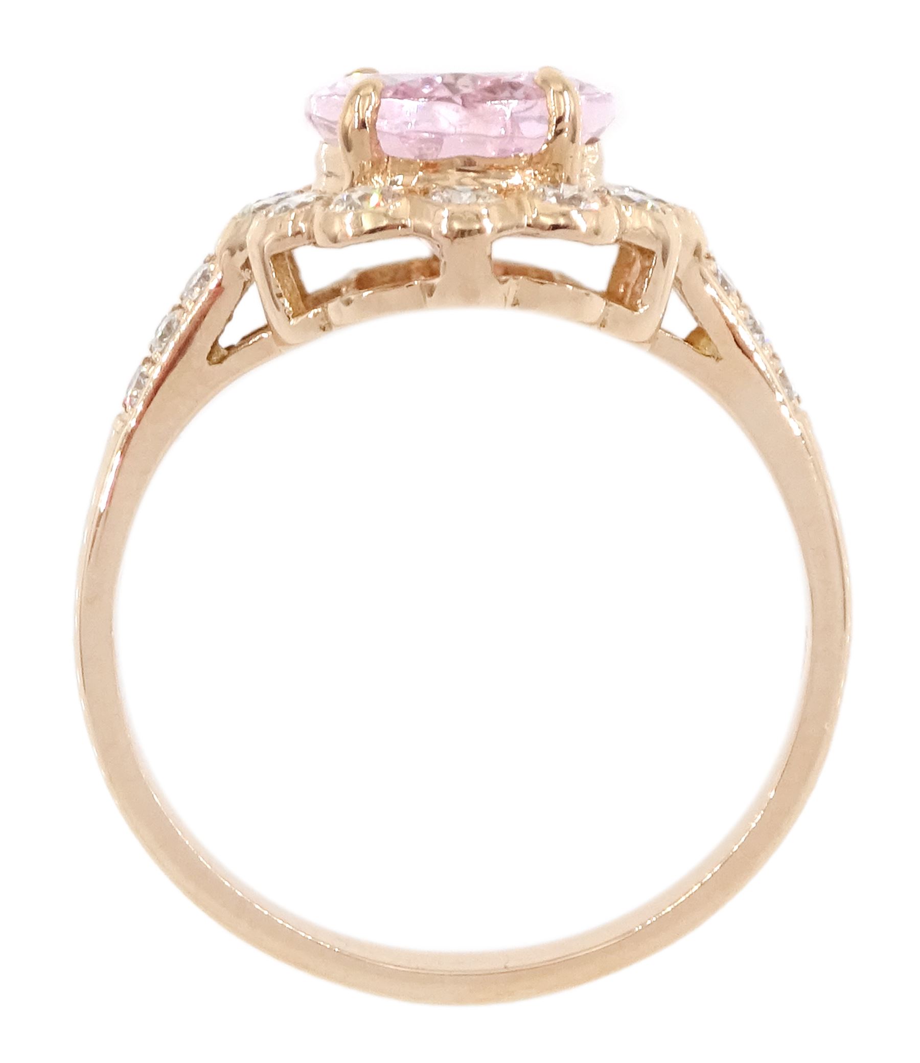 18ct rose gold oval cut morganite and milgrain set, round brilliant cut diamond cluster ring, with diamond set shoulders, stamped 750, morganite approx 2.30 carat, total diamond weight approx 0.65 carat