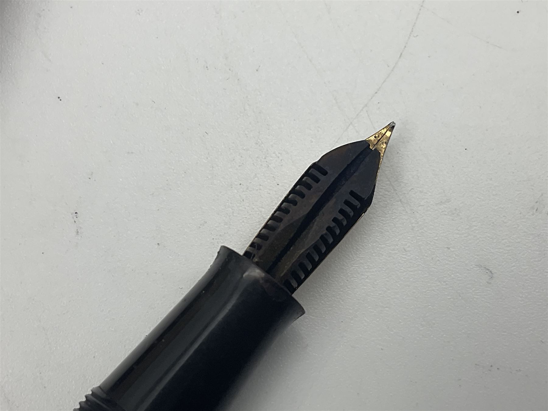 Group of Waterman pens and propelling pencils, to include a fountain pen, the black barrel with rolled gold cap and nib stamped 14ct, together with a matching propelling pencil, in box, together with a further fountain pen with gold nib stamped 14ct, stainless steel fountain pen and rollerball set in box, propelling pencil with maroon barrel etc, largest L13cm (7)