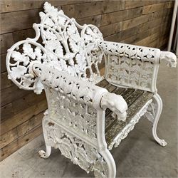 20th century Coalbrookdale design cast iron oak leaf and acorn armchair, white painted cast iron frame with slatted wooden seat, the pierced and shaped back decorated with scrolling oak branches and leafage, flanked by dog mask arm terminals over cabriole supports with paw feet