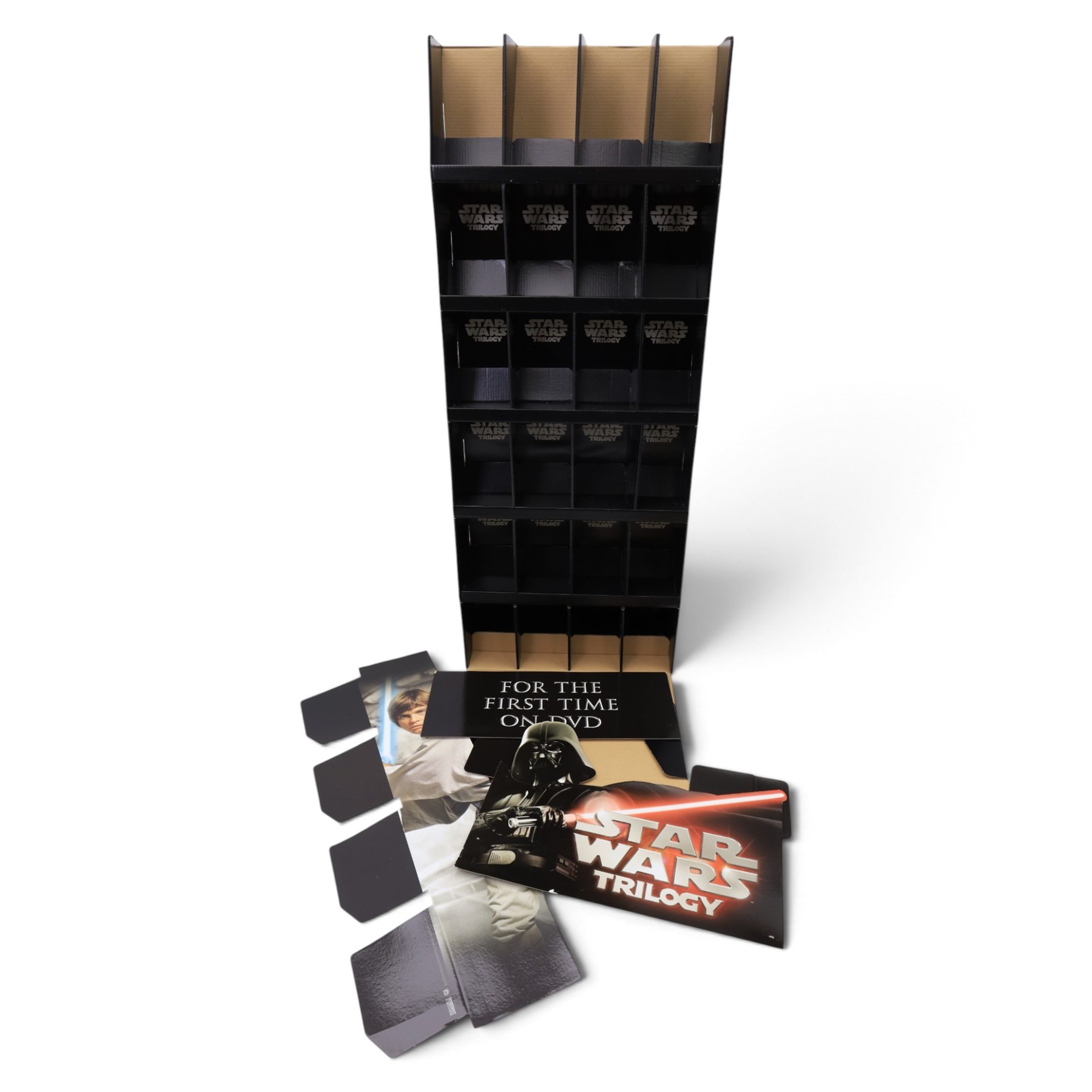 Star Wars cardboard advertising signs and a collection of posters, including life-size cardboard cut of Kylo-Ren, Star Wars Trilogy DVD display stand, etc