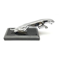 A modern Jaguar car mascot, in leaping pose, upon base, overall L20cm. 
