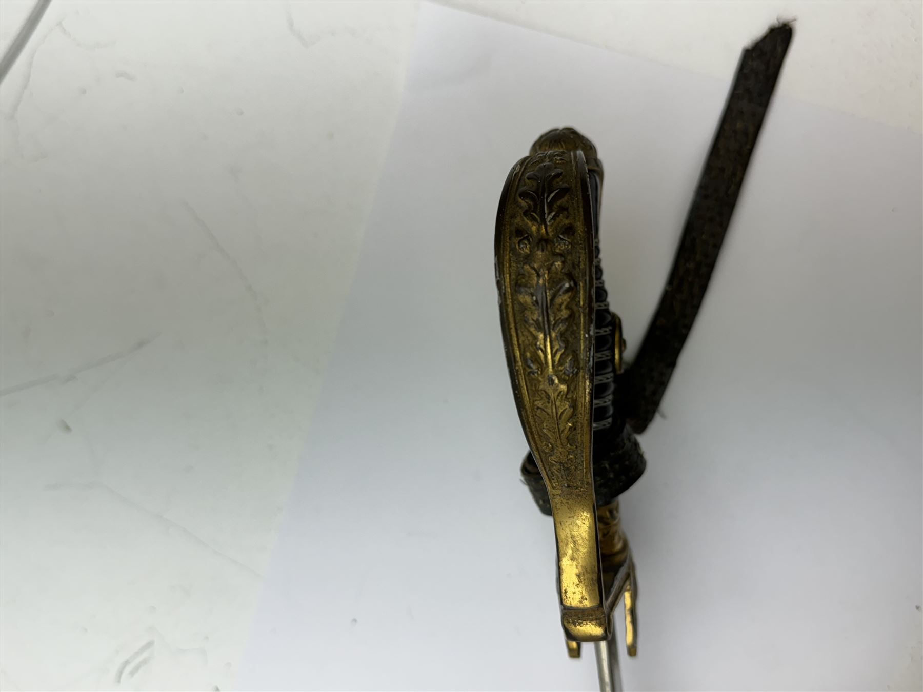 German infantry dress sword, dove head stirrup handle with black wire-bound grip cast cross guard with German eagle set into the langet, the curved 81cm single edge blade with single fuller marked Elckhorn Solingen, L93cm overall