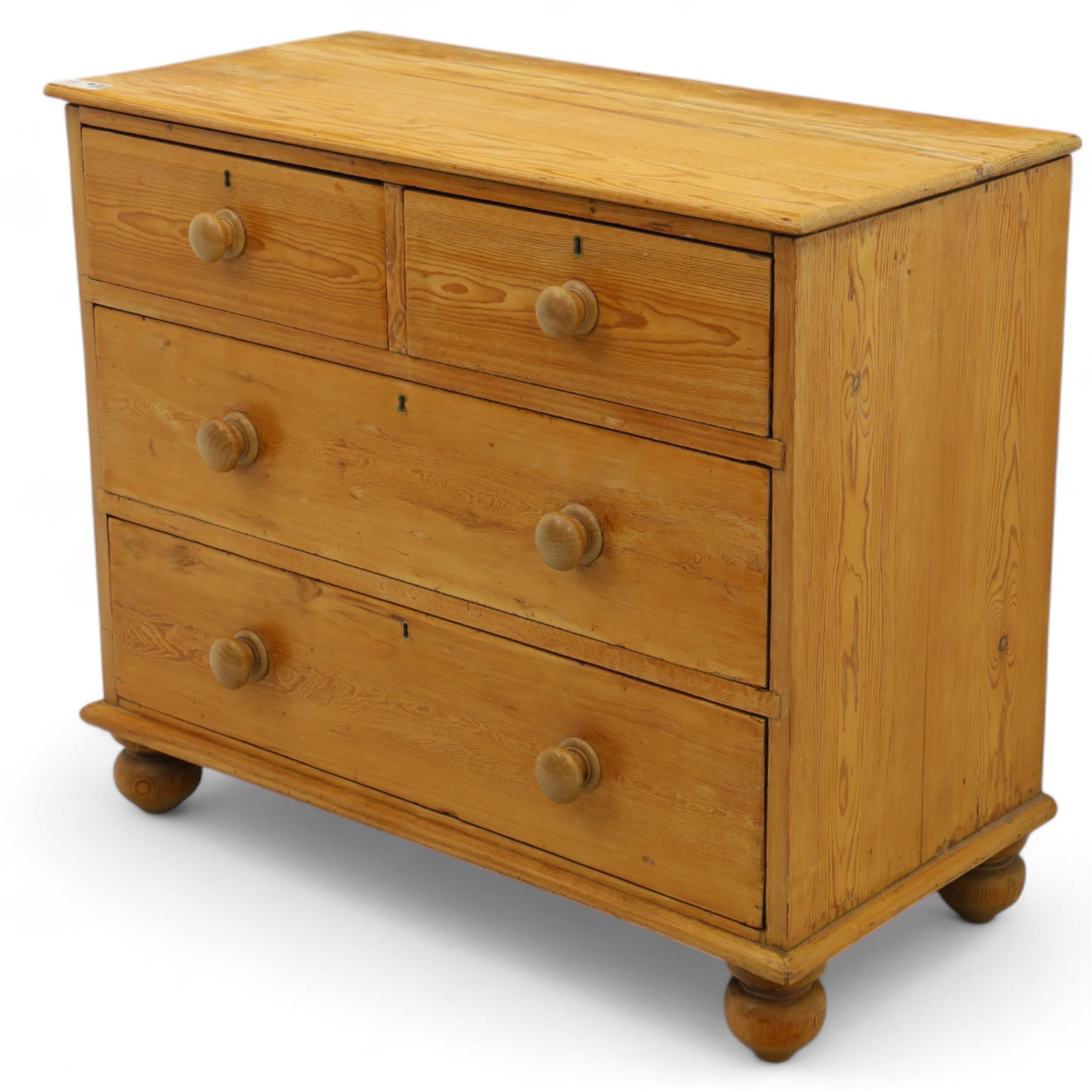 Victorian stripped pine chest, rectangular top over two short and two long drawers with turned wooden knob handles, on bun feet