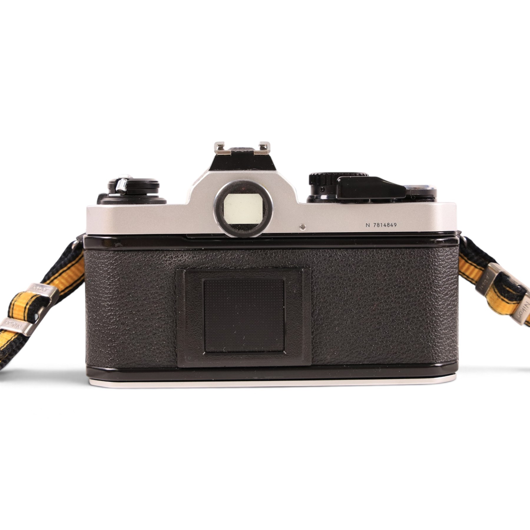 Nikon FM2 film camera body serial no. 7814849 with a Sigma 24mm lens serial no.5083190, camera user manual and Nikon carrying case