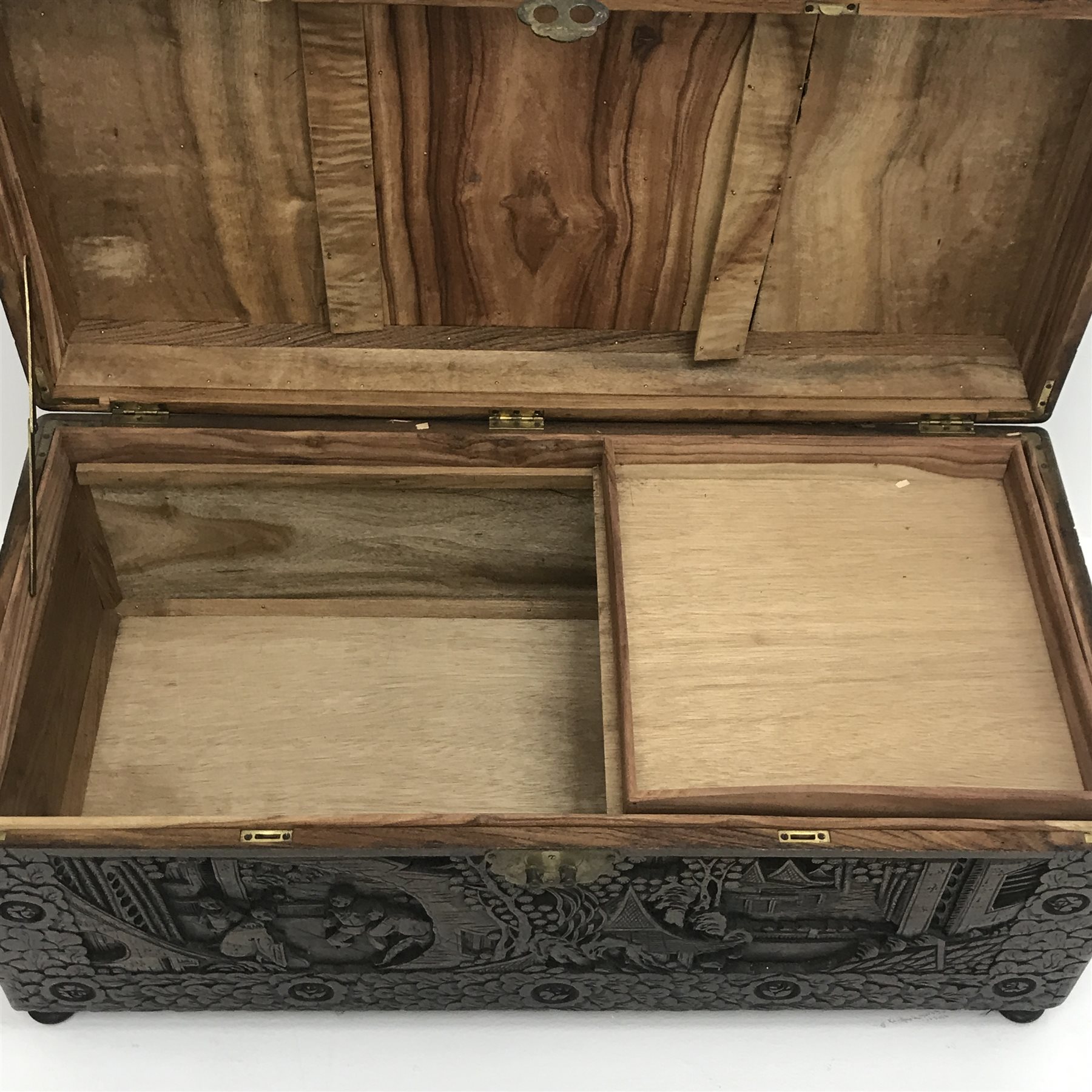  Eastern carved camphor wood blanket box depicting urban scene, W94cm, H49cm, D45cm   