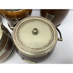 Five early 20th century biscuit barrels with silver-plated mounts, one made from Mahogany from HMS Hindustan