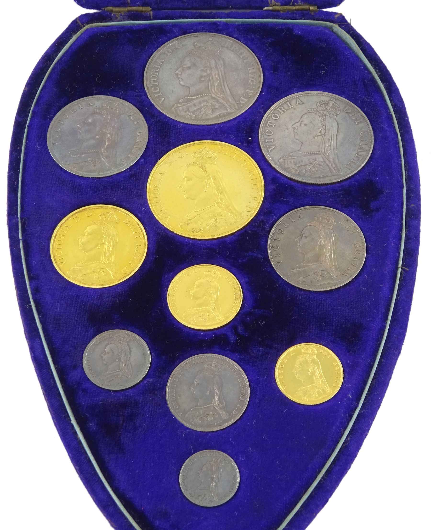 Queen Victoria 1887 specimen coin set, comprising gold half sovereign, sovereign, two pounds and five pounds, silver threepence, sixpence, shilling, florin, halfcrown, double florin and crown, housed in purple velvet case
