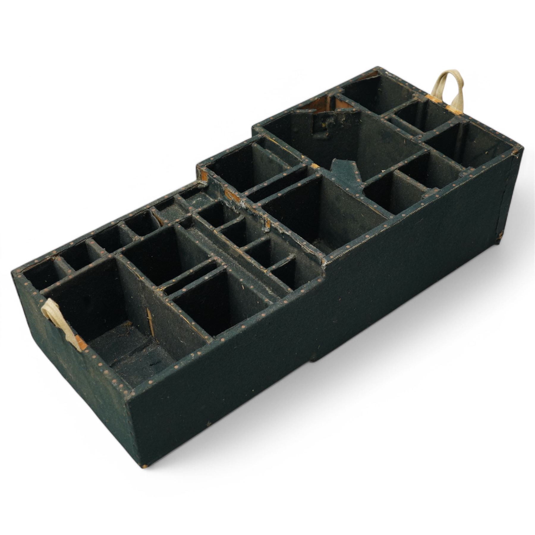 Early 19th century teak and brass bound silver campaign chest, fitted with brass L-shaped brackets and heavy weight carrying handles, the hinged lid enclosing two removeable trays with divisions and lined in blue baize, fitted with two 'R. Cooper & Son' brass locks