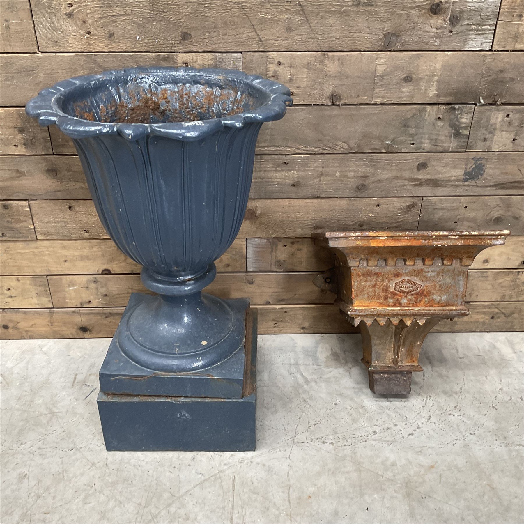 19th century blue painted cast iron lotus garden urn with plinth, and a cast iron rain hopper