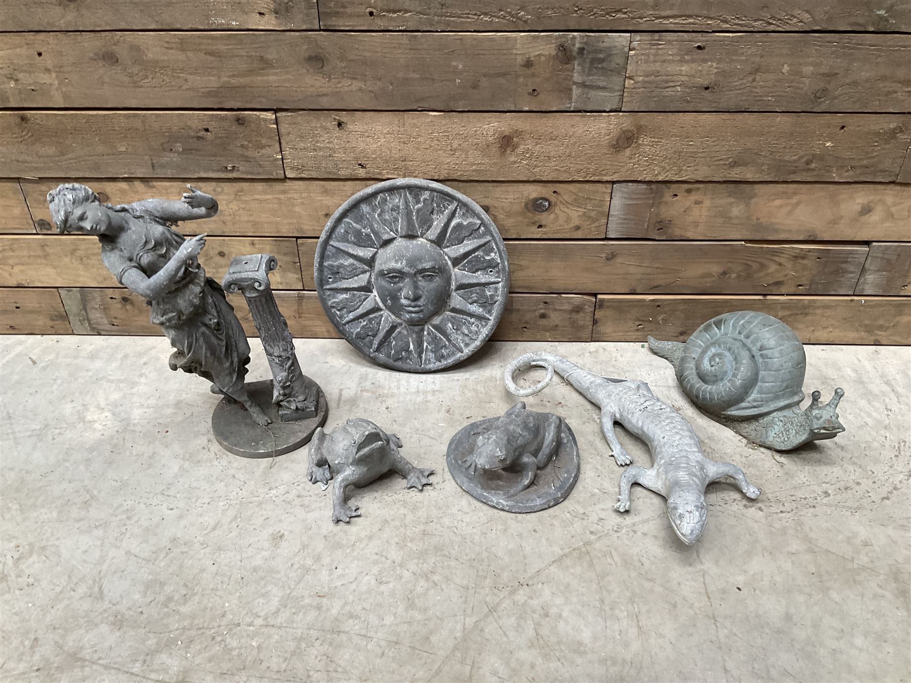 Lead garden ornaments to include two frogs, lizard, sun mask,  figure and a composite snail (6)