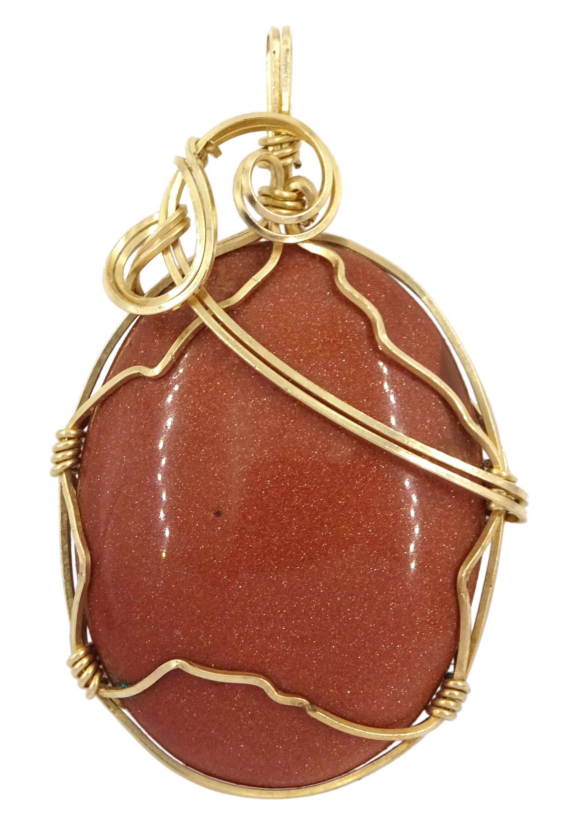 9ct gold wire goldstone pendant