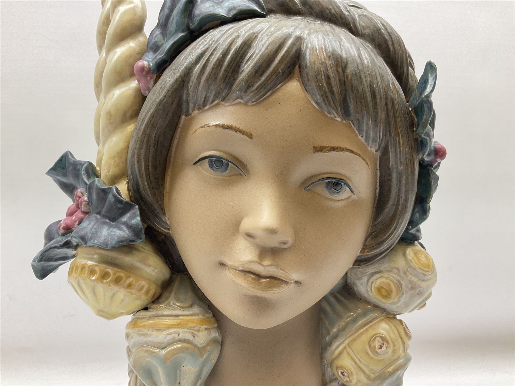 Lladro figure, Holiday Glow, modelled as a bust donning headpiece of holly, baubles and candles