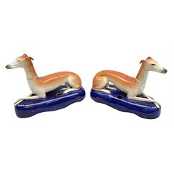 Pair of Staffordshire recumbent greyhoun