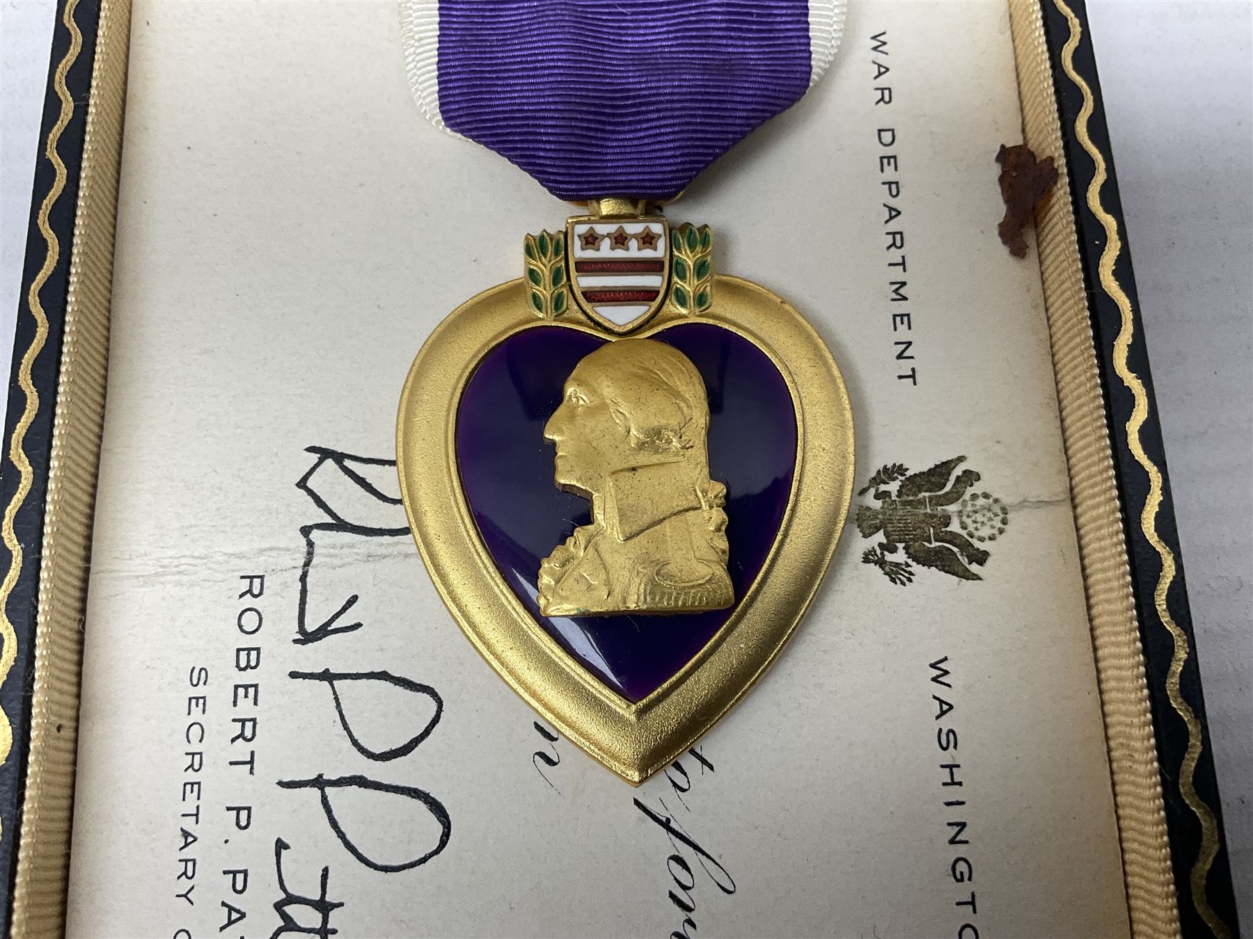 American Purple Heart Medal awarded to 32634848 Charles H. Poppo; cased with identity tags and paperwork; and Bronze Star Medal awarded to U.S. Marine Esteban T. Maranao; cased; American WWII Victory Medal and Asiatic Pacific Campaign Medal