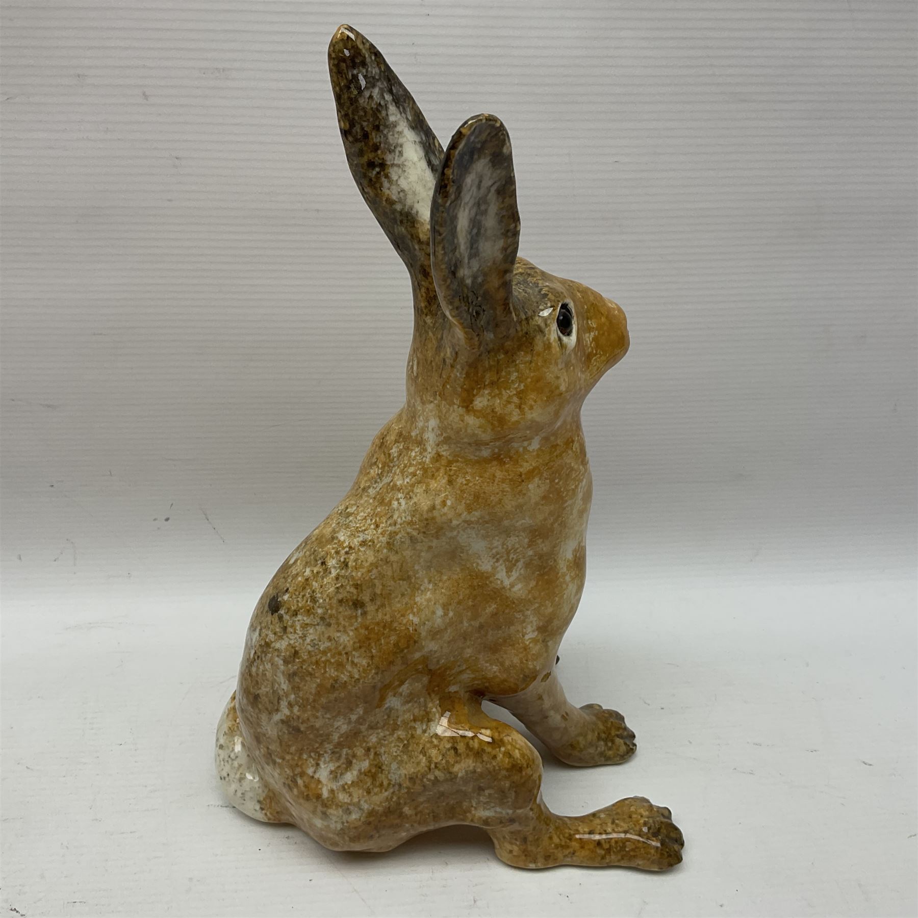 Two Winstanley hares, with glass eyes, sizes 1 and 5, H12.5cm and H31cm (2)