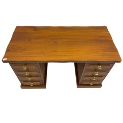 Sam Cryer ‘Cryercraft’ - solid elm twin pedestal desk, waved rectangular top, fitted with eight drawers, on plinth base