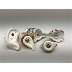 Five Royal Crown Derby paperweights, comprising Chaffinch, and Goldcrest, each with gold stopper, and box, example modelled as a Beaver with silver stopper, and two further examples lacking stoppers. 