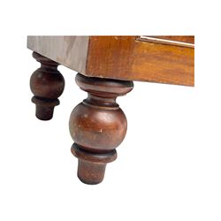 Victorian mahogany bow-fronted chest, fitted with two short over three long graduated cockbeaded drawers, on turned bun supports